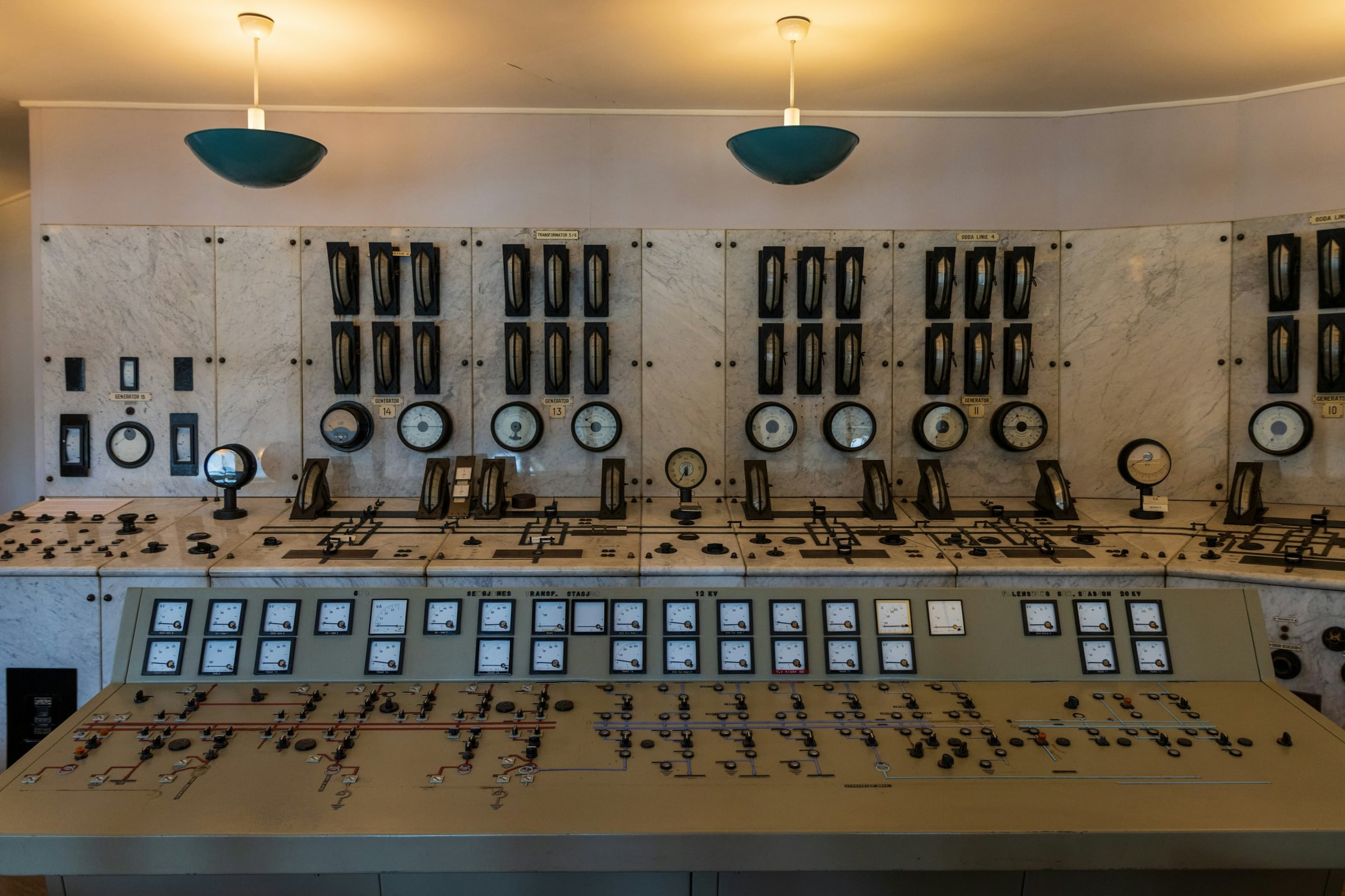 Industrial control room with operator consoles