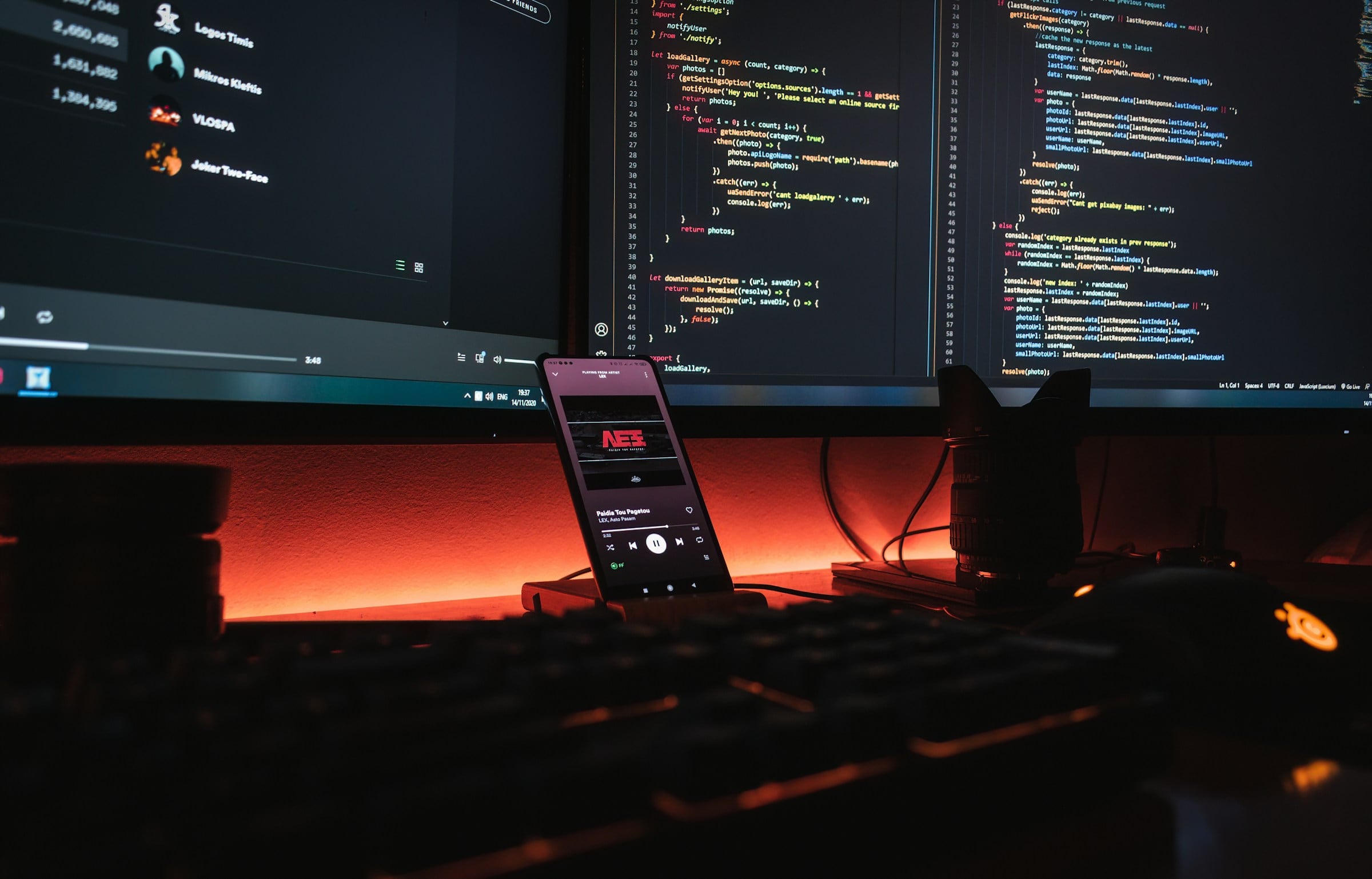 Monitors showing source code during a software upgrade