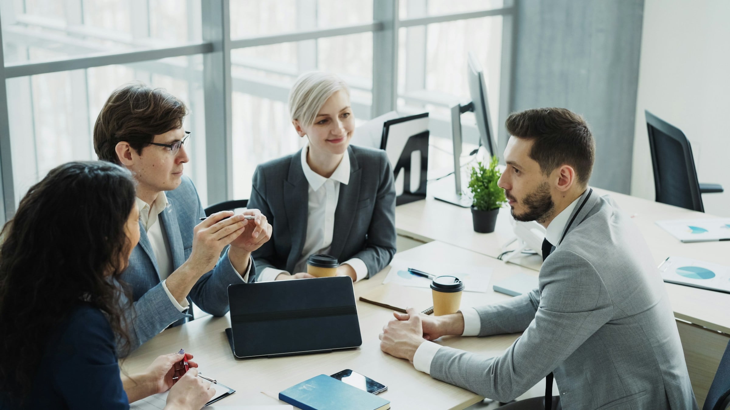 Diverse team collaborating in a modern office